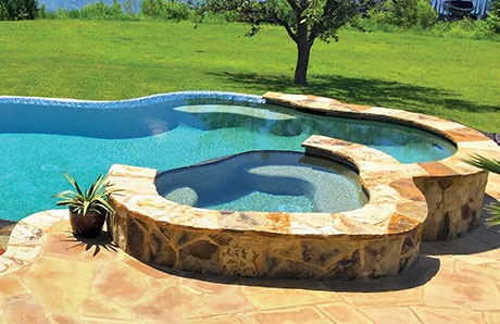 Free Form Concrete Pool Spa with flagstone