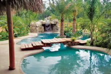 lagoon-style-pool-with-bridge-and-grotto