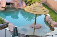 Palapa-umbrella-on-lagoon-style-pool