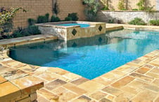 Roman-pool-with-oragne-stone-deck