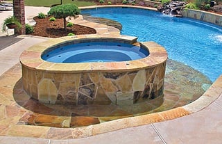 elevated-custom-spa with-flagstone-exterior.jpg