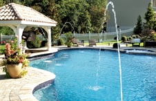arc-water-feature-hitting-pool-surface