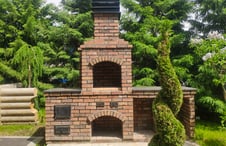 brick-fireplace-in-backyard