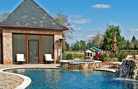 brick-poolhouse-by-pool.jpg
