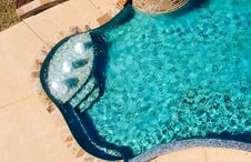 bubbler fountains on pool tanning ledge