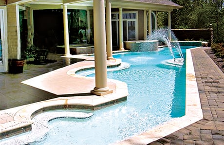 free-form-concrete-pool-with-fountains.jpg