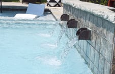 copper-scupper-trio-on-swimming-pool-