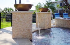 copper-water-bowls-above-pool