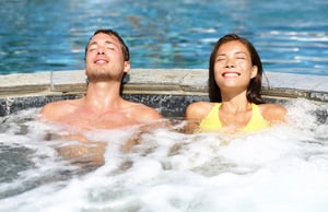 couple-relaxing-in-jetted-spa
