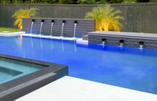 dark-ultra-modern-water-feature-on-pool