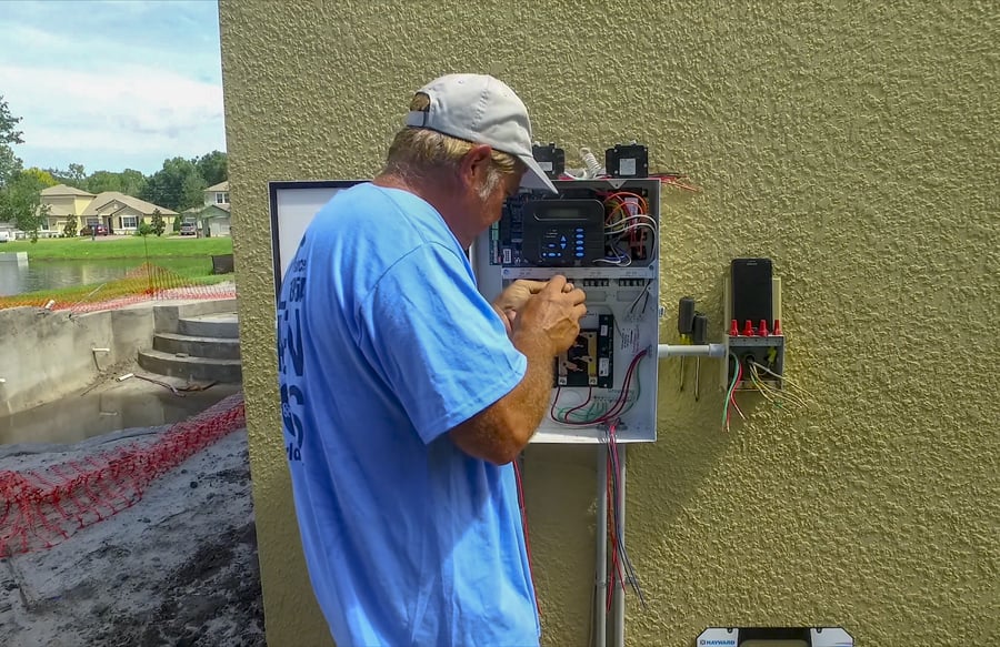 electrician installing pool automation