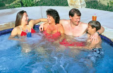 family-socializing-in-gunite-spa