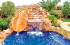 faux rock waterfall pool slide