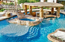 faux-stone-bridge-on-custom-pool