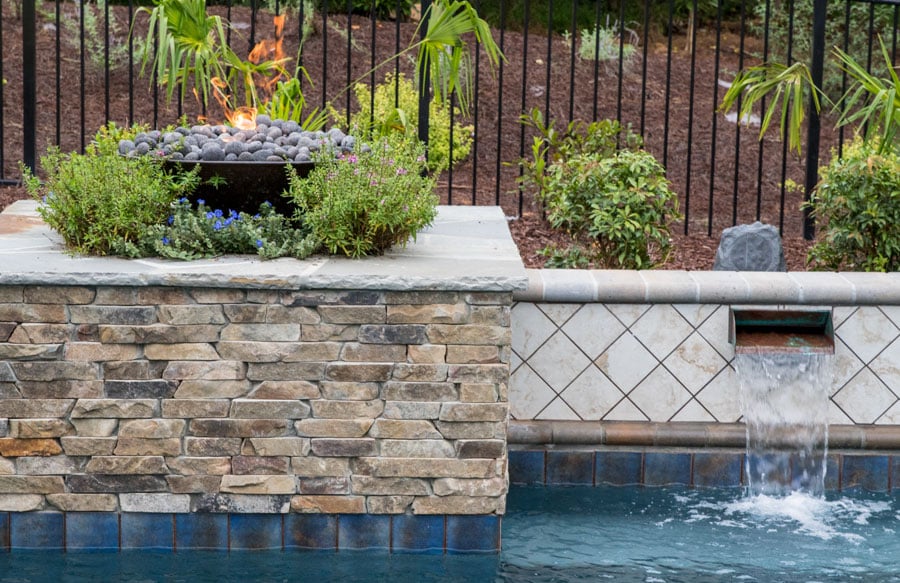 fire-bowl-and-scupper-water-feature-on-pool