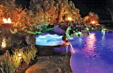 fire-bowls-on-pool-at-night