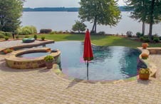 free-form-pool-with-concrete-pavers