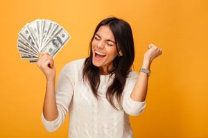 happy women holding money-1