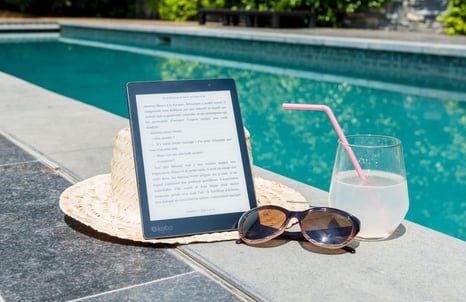 hat sunglass tablet poolside