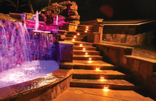 illuminated-deck-steps-by-pool-at-night