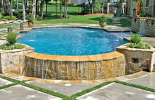 Roman-pool-with-flagstone-clad-zero-edge