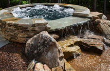 custom-spa-with-natural-stone-facade