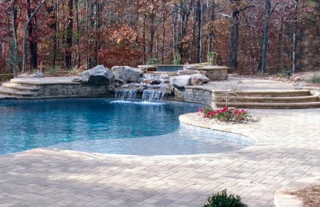 custom-spa-with-rock-waterfall-facade
