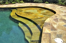 tanning-shelf-entry-steps-on-gunite-pool