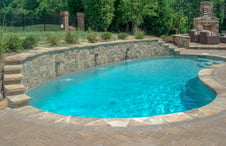 kidney-pool-with-raised-wall-water-feature