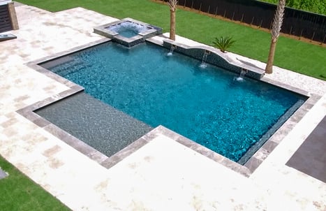 modified-rectangle-gunite-pool-with-dark-coping