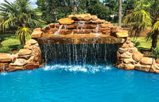 natural stone grotto pool waterfall