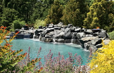 natural-stone-waterfall-on-pool