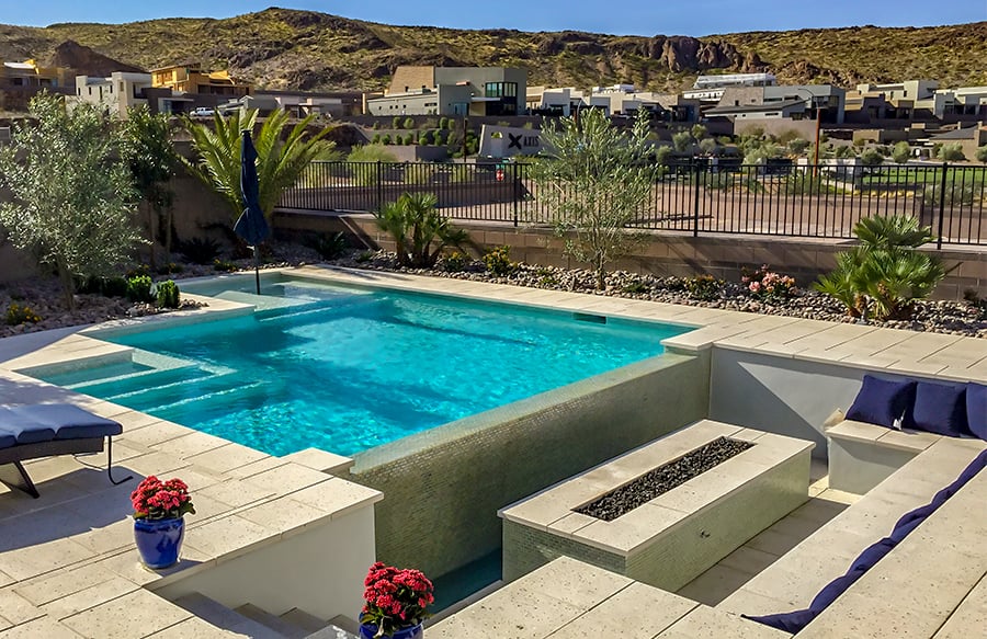 negative-edge-pool-with-seating-firepit