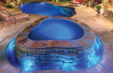 organic-shaped-rimflow-spa-on-pool