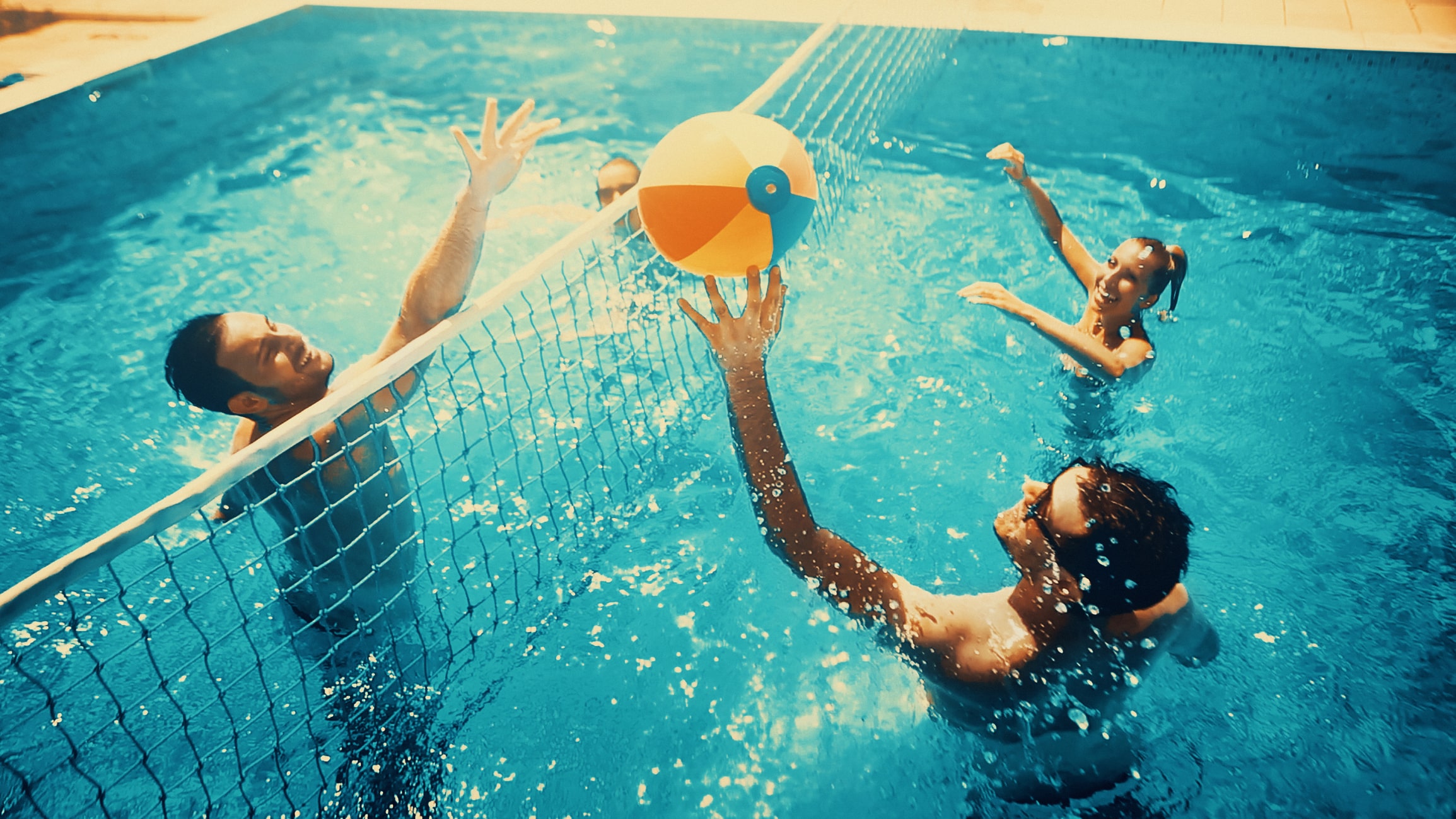 Playing Volleyball In Swimming Pool