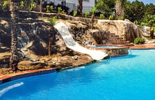 pool-rock-waterfall-slide-built-on-slope