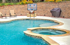 pool-with-deck-mounted-basketball-hoop