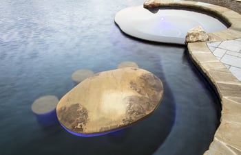 pool-with-stone-table-and-stools