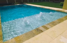 rectangle-pool-with-bubblers-on-tanning-shelf