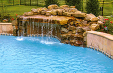 rock-grotto-waterfall-on-pool