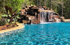 rock-grotto-waterfall-on-swimming-pool