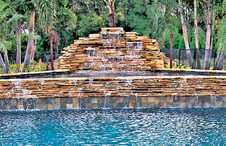 rock-waterfall-on-inground-pool