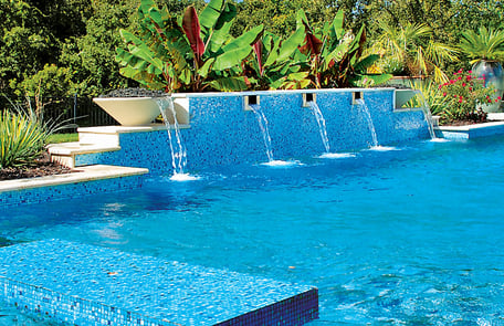 10 Swimming Pool Water Feature Ideas (Besides Rock Waterfalls)