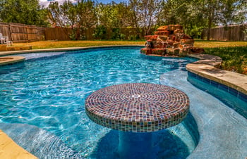 round-tiled-table-with-curve-bench-in-pool