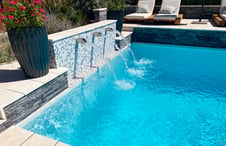 stainless-steel-spout-water-features-on-pool