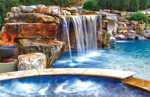 stone-grotto-waterfall-on-luxury-pool