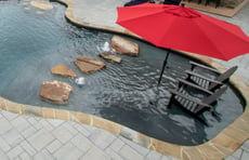 stone-steps-across-swimming-pool