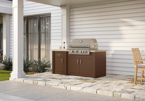 STONO 71-inch Vista outdoor kitchen island with bronze base and concrete countertop on a stone patio