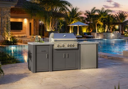 STONO 92-inch Solara outdoor kitchen island with charcoal base next to an illuminated pool at night