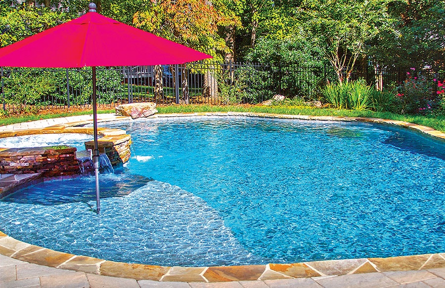 Swimming Pool With Baja Shelf and Red Umbrella